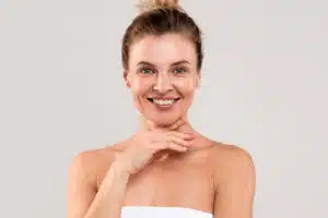 Surgical procedures involve removing excess skin and tightening the underlying structures but come with longer recovery times and higher costs.