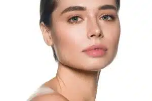Close-up of a woman with smooth, youthful eyes after blepharoplasty, highlighting refreshed and rejuvenated eyelids.
